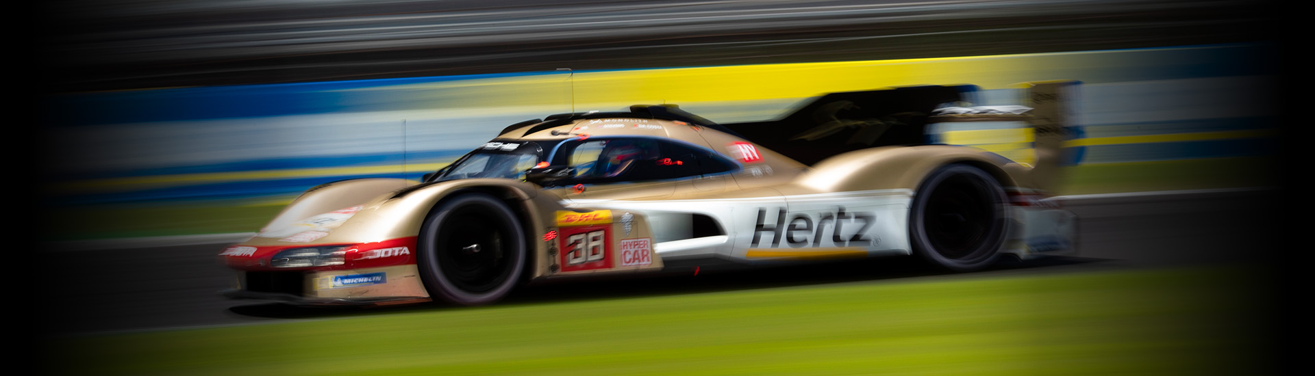 Hertz unveils new Porsche race car, sponsorship at Estero headquarters 